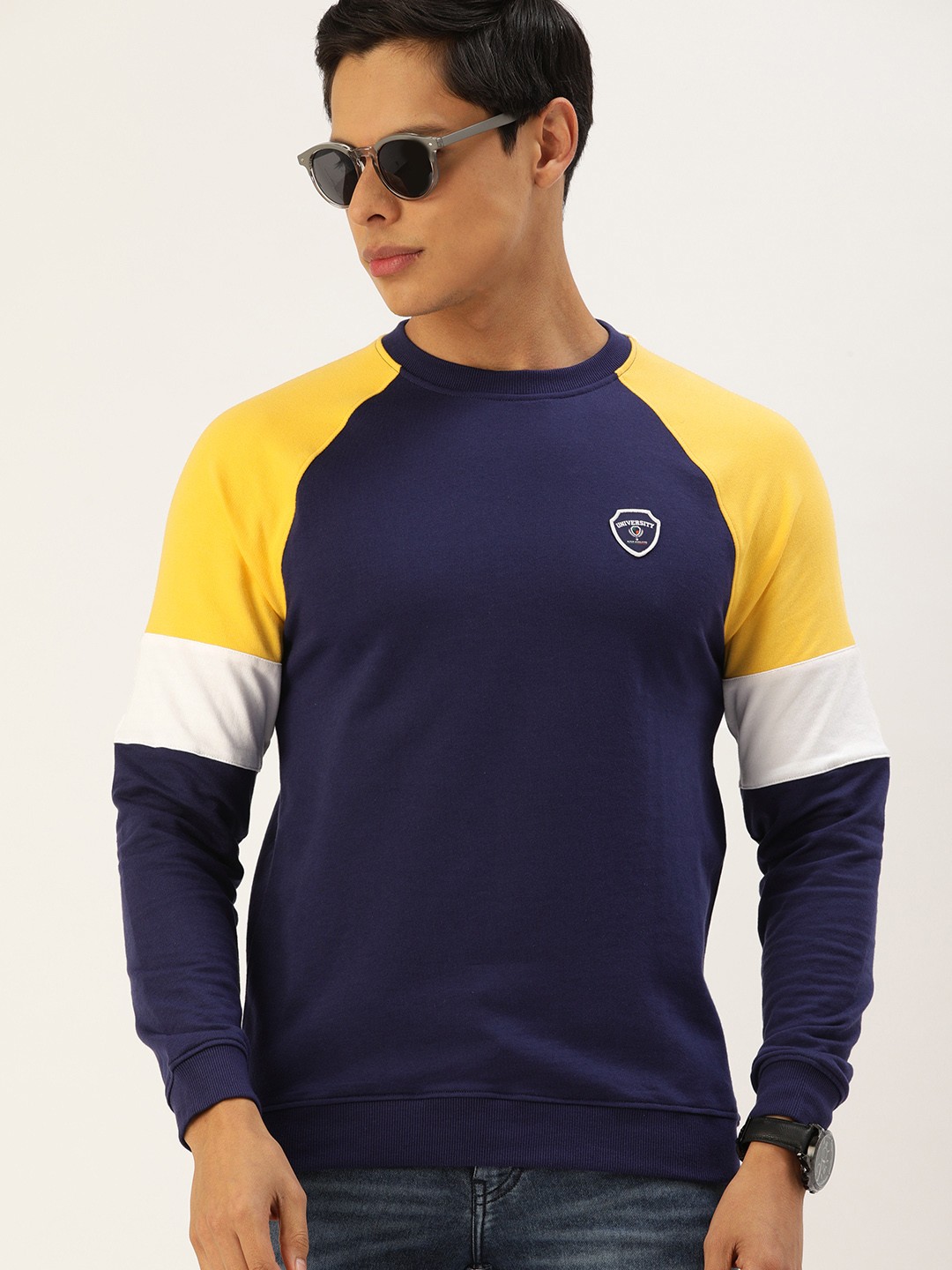 

PETER ENGLAND UNIVERSITY Men Navy Blue & Mustard Yellow Solid Sweatshirt