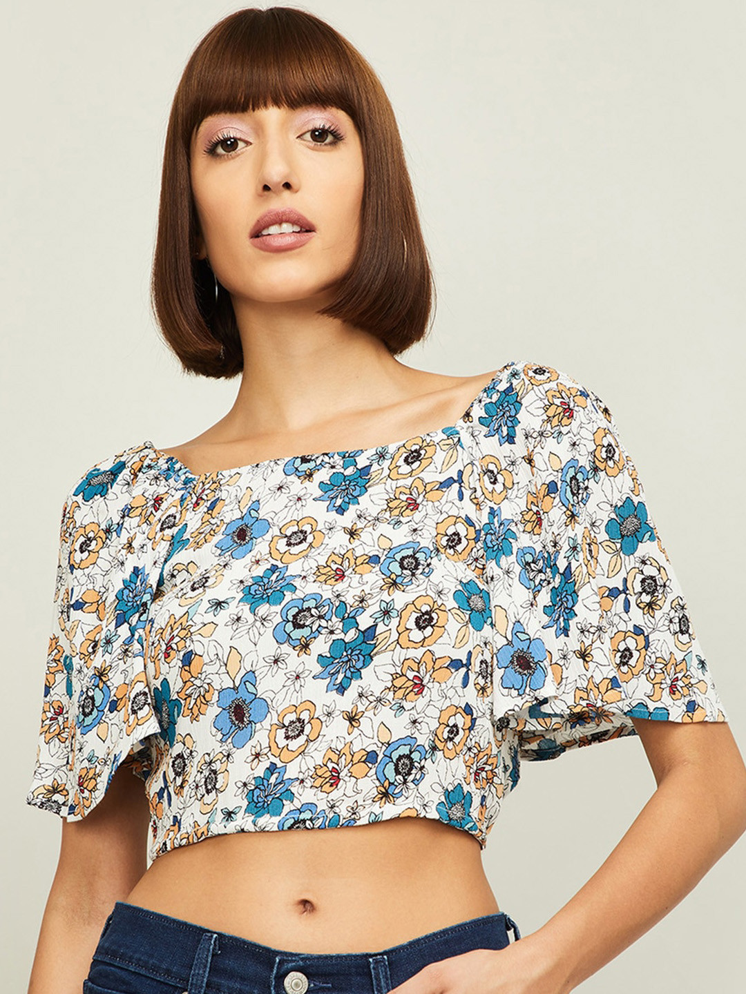 

Ginger by Lifestyle Women Off-White & Blue Floral Printed Regular Crop Top