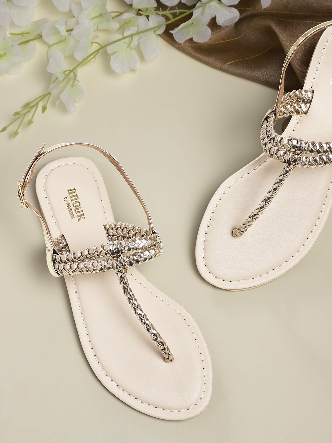

Anouk Women Gold-Toned Solid Braided T-Strap Flats