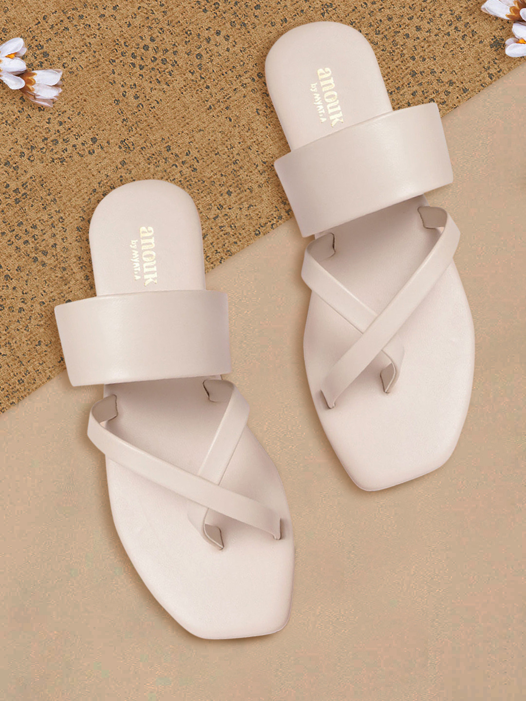 

Anouk Women Off White Solid Criss-Cross Handcrafted One Toe Flats