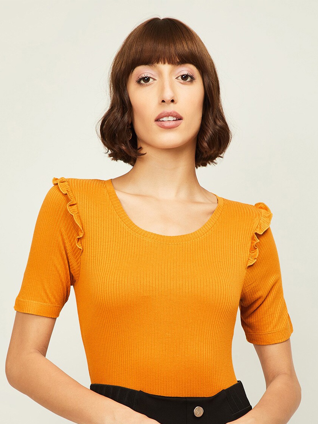 

Bossini Women Mustard Yellow Solid Fitted Top
