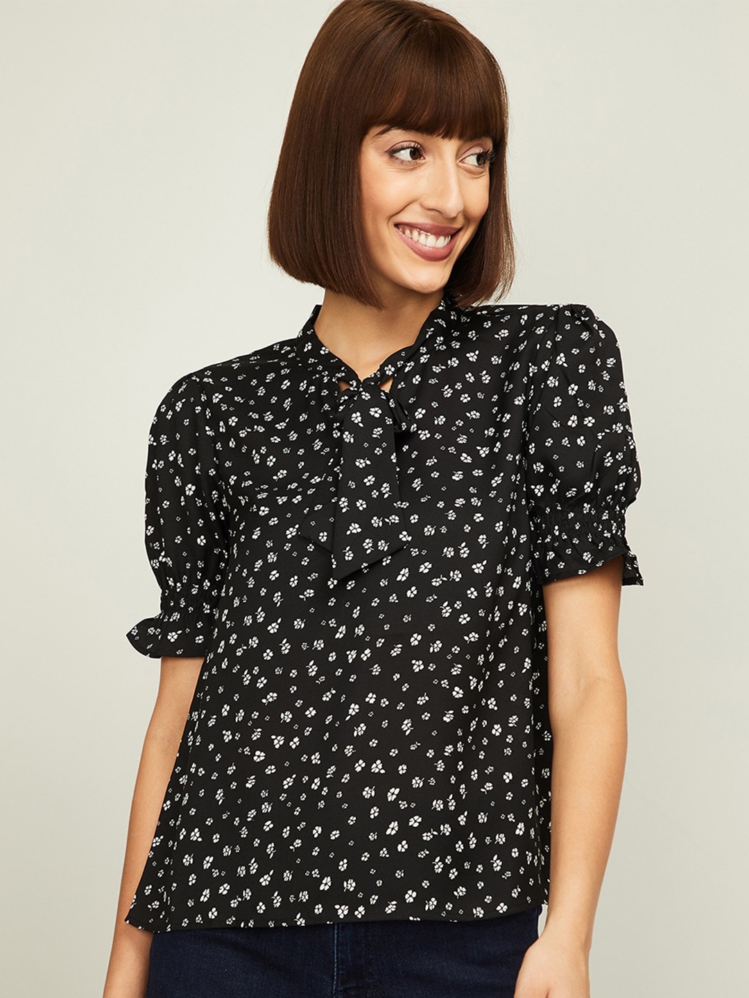 

Bossini Black Floral Tie-Up Neck Puff Sleeve Regular Top