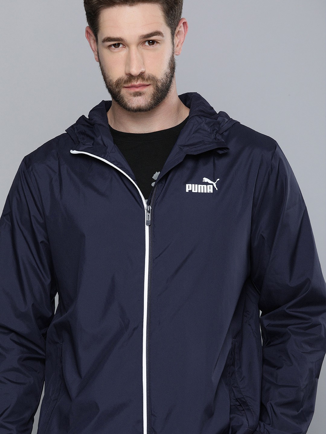 

Puma Men Navy Blue Essential Solid Water Repellent Windbreaker Jacket