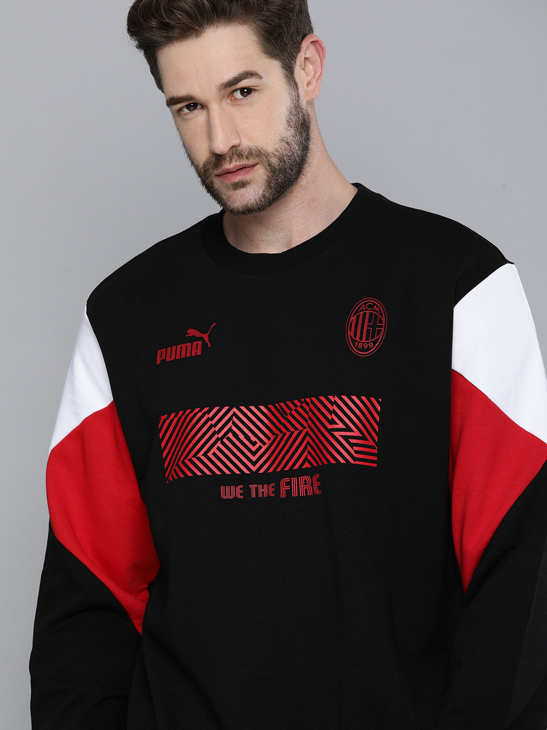 

Puma Men Black & Red Colourblocked Football Sweatshirt