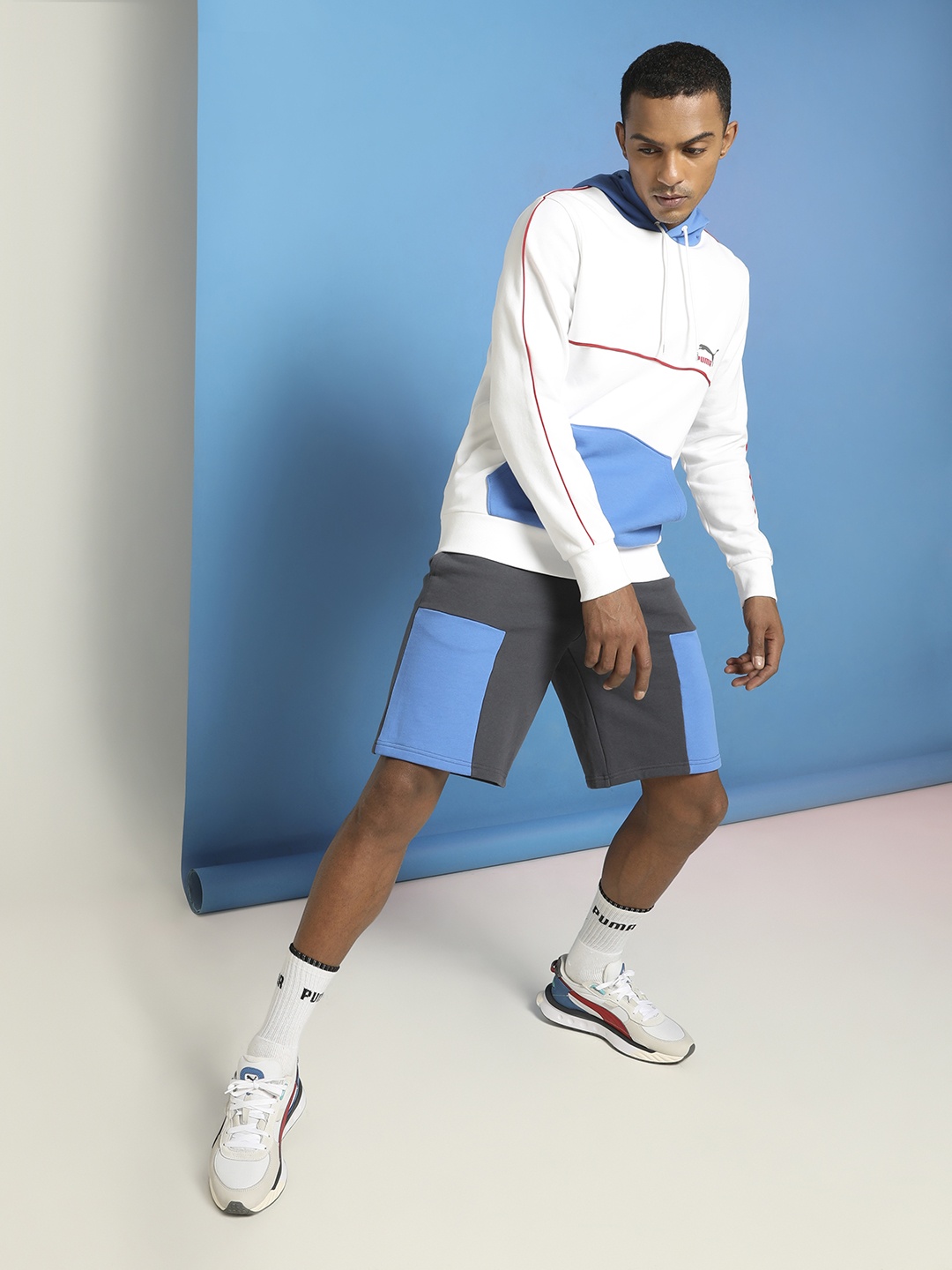 

Puma Men White & Blue Colourblocked Hooded Sweatshirt