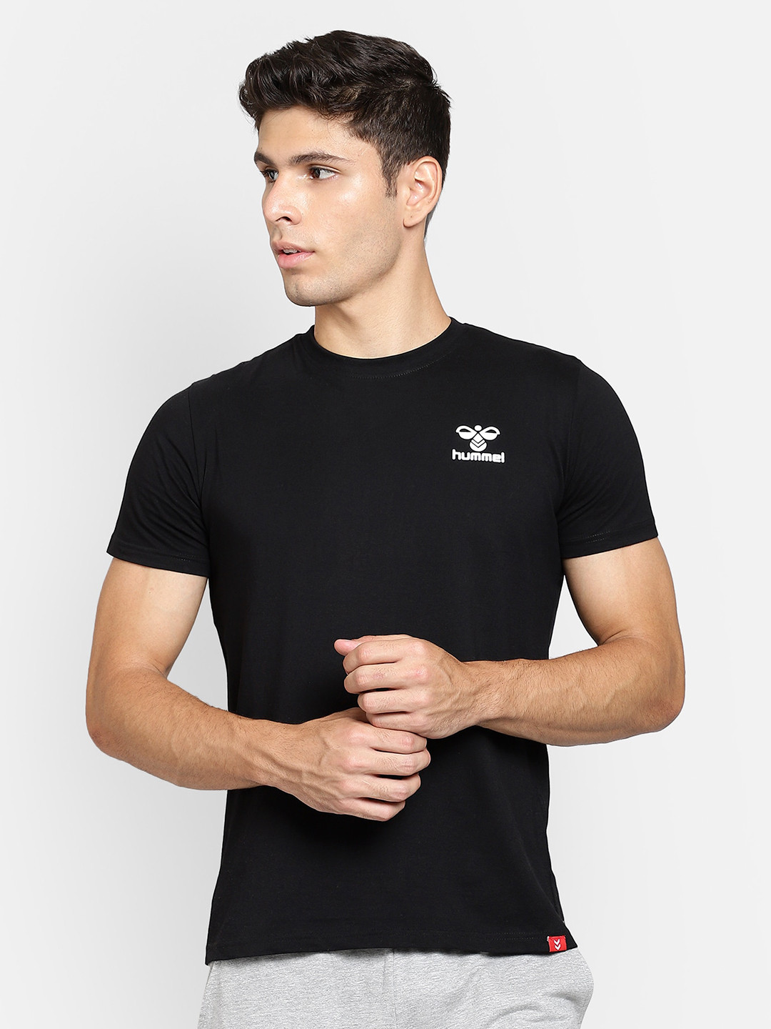 

hummel Men Black Solid Short Sleeves Pure Cotton T-shirt