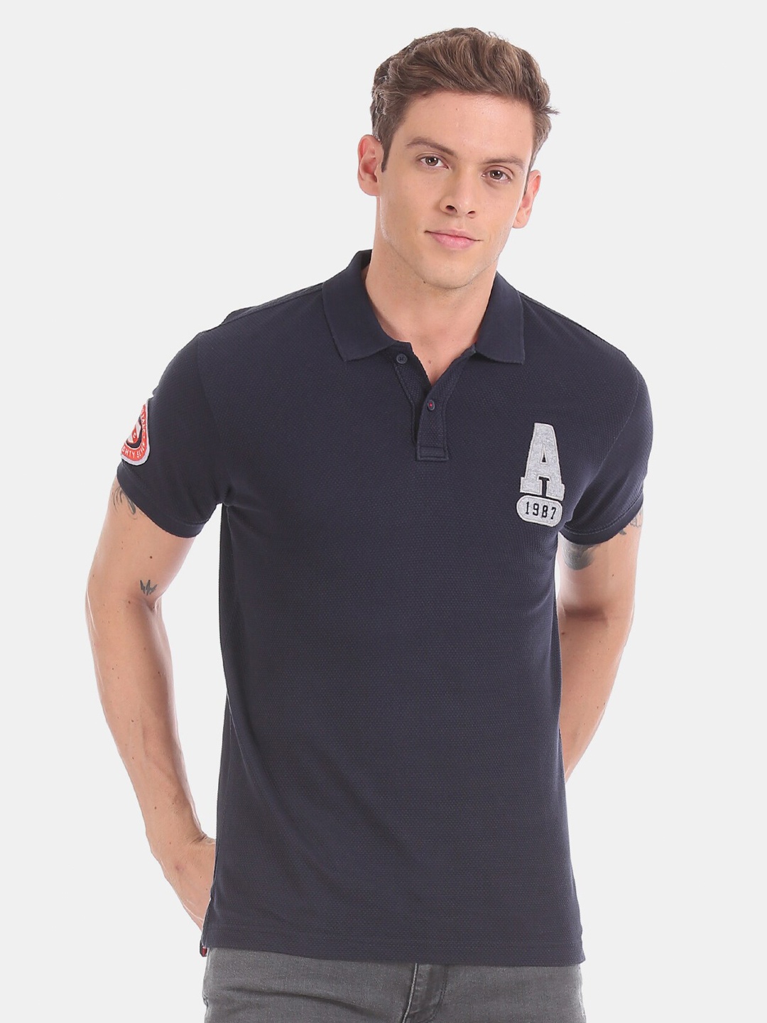 

Aeropostale Men Blue Polo Collar Indigo Applique Pure Cotton T-shirt