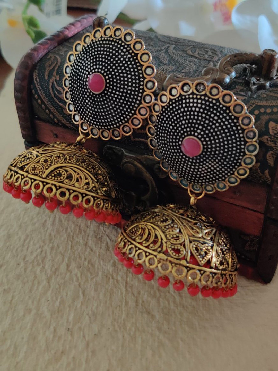 

Binnis Wardrobe Gold-Toned & Red Dome Shaped Jhumkas