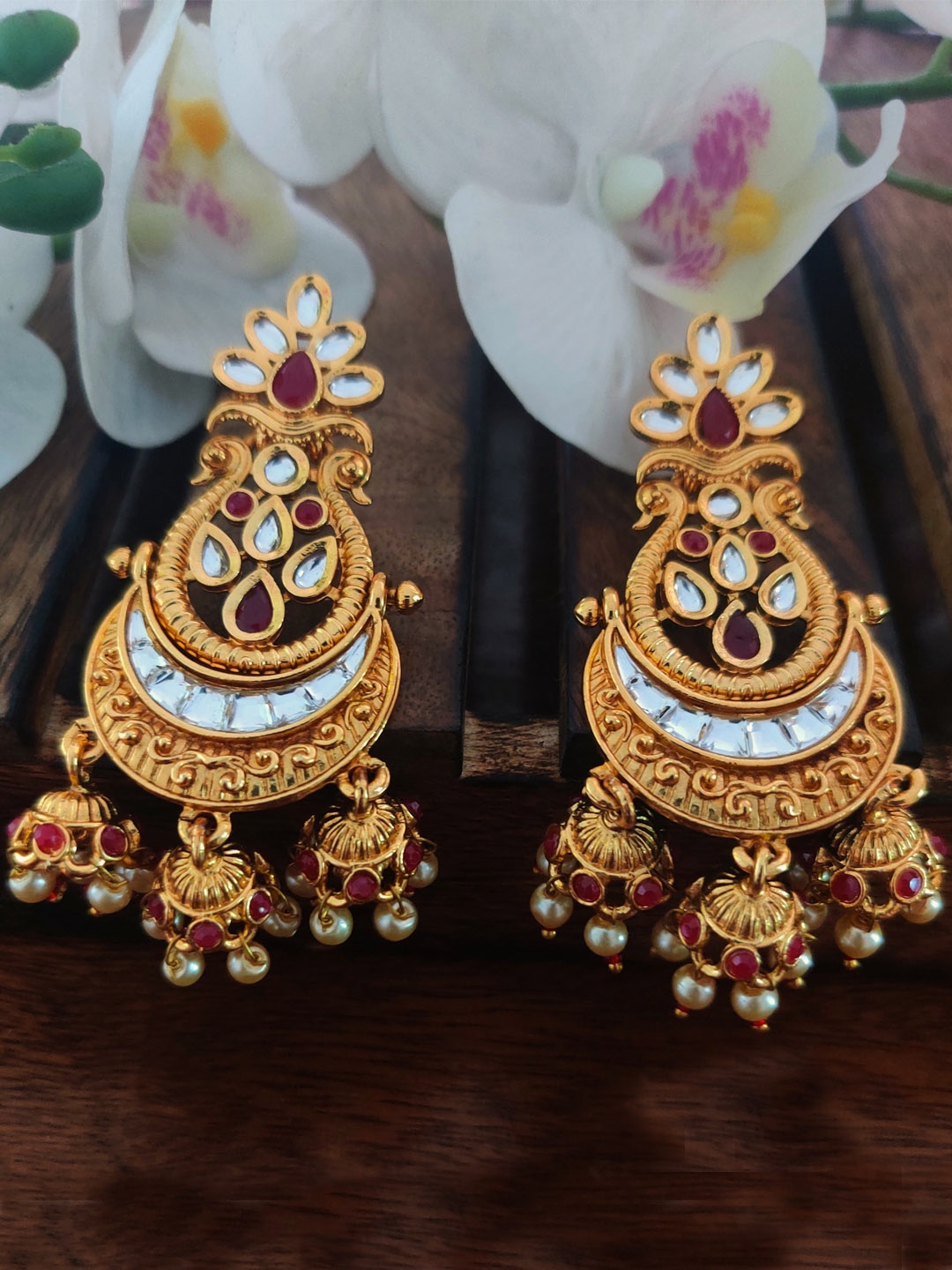 

Binnis Wardrobe Gold-Toned and Red Contemporary Chandbalis Earrings