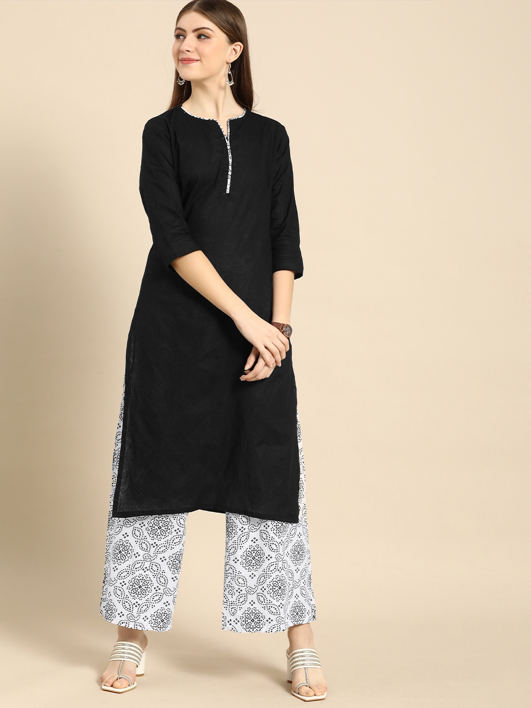 

Anouk Women Black & White Solid Pure Cotton Kurta with Printed Palazzos