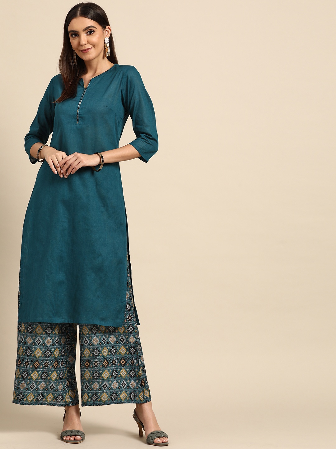 

Anouk Women Teal Blue & Yellow Solid Pure Cotton Kurta with Printed Palazzos