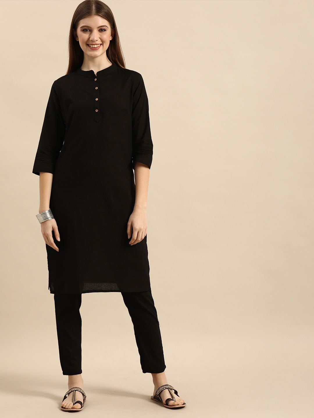 

Anouk Women Black Solid Regular Pure Cotton Kurta with Trousers