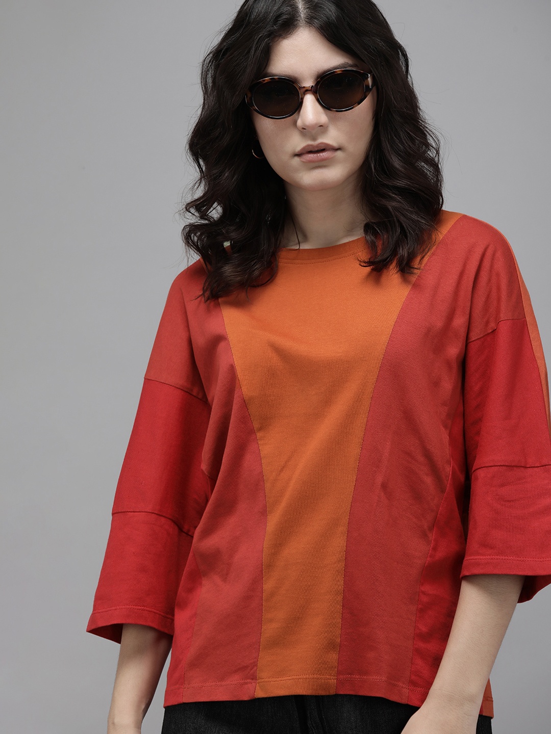 

Roadster Women Red & Orange Colourblocked Regular Top