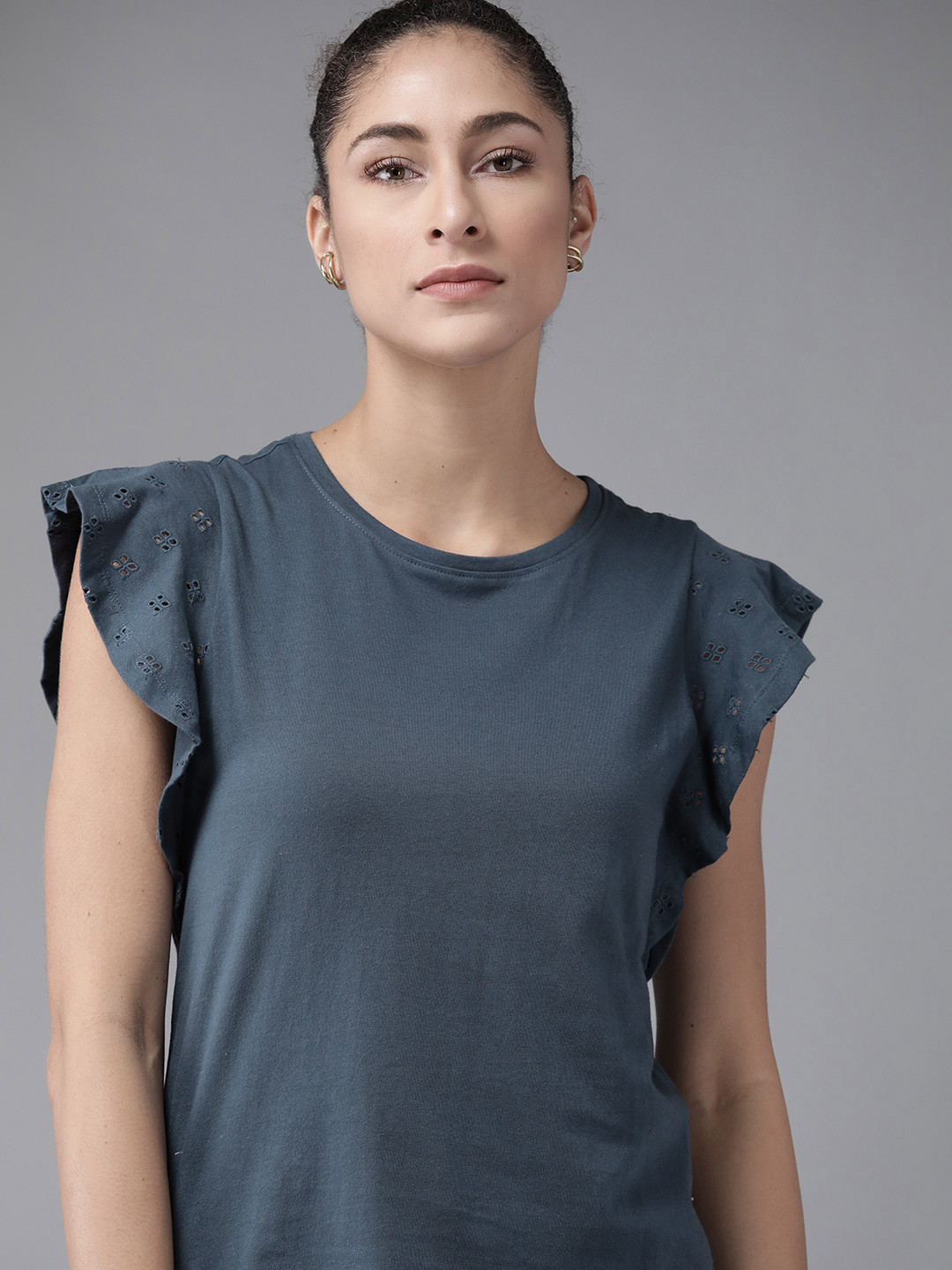 

Roadster Navy Blue Solid Cotton Schiffli Regular Top with Embroidered Detail