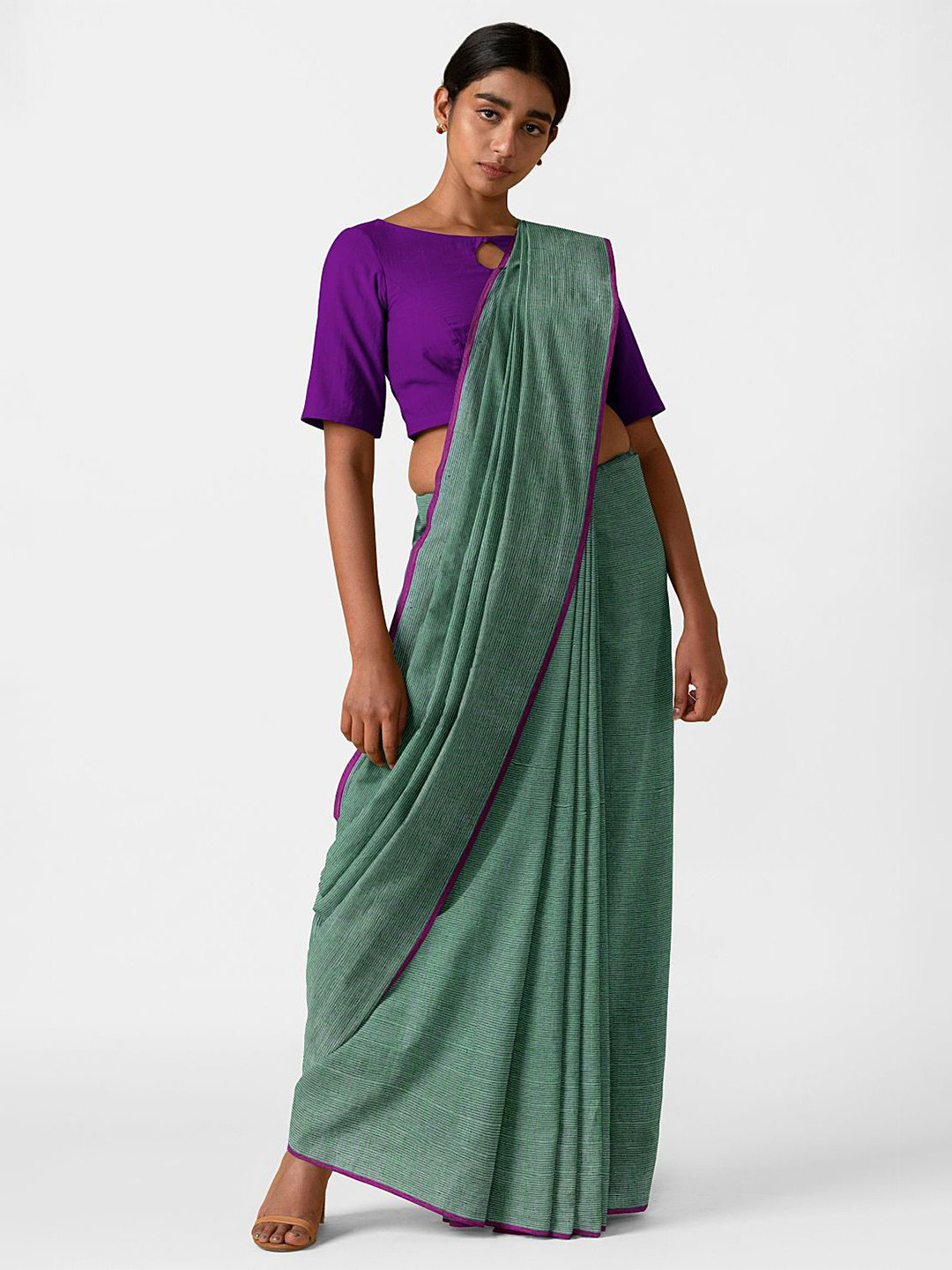 

Taneira Green & Purple Striped Linen Blend Saree