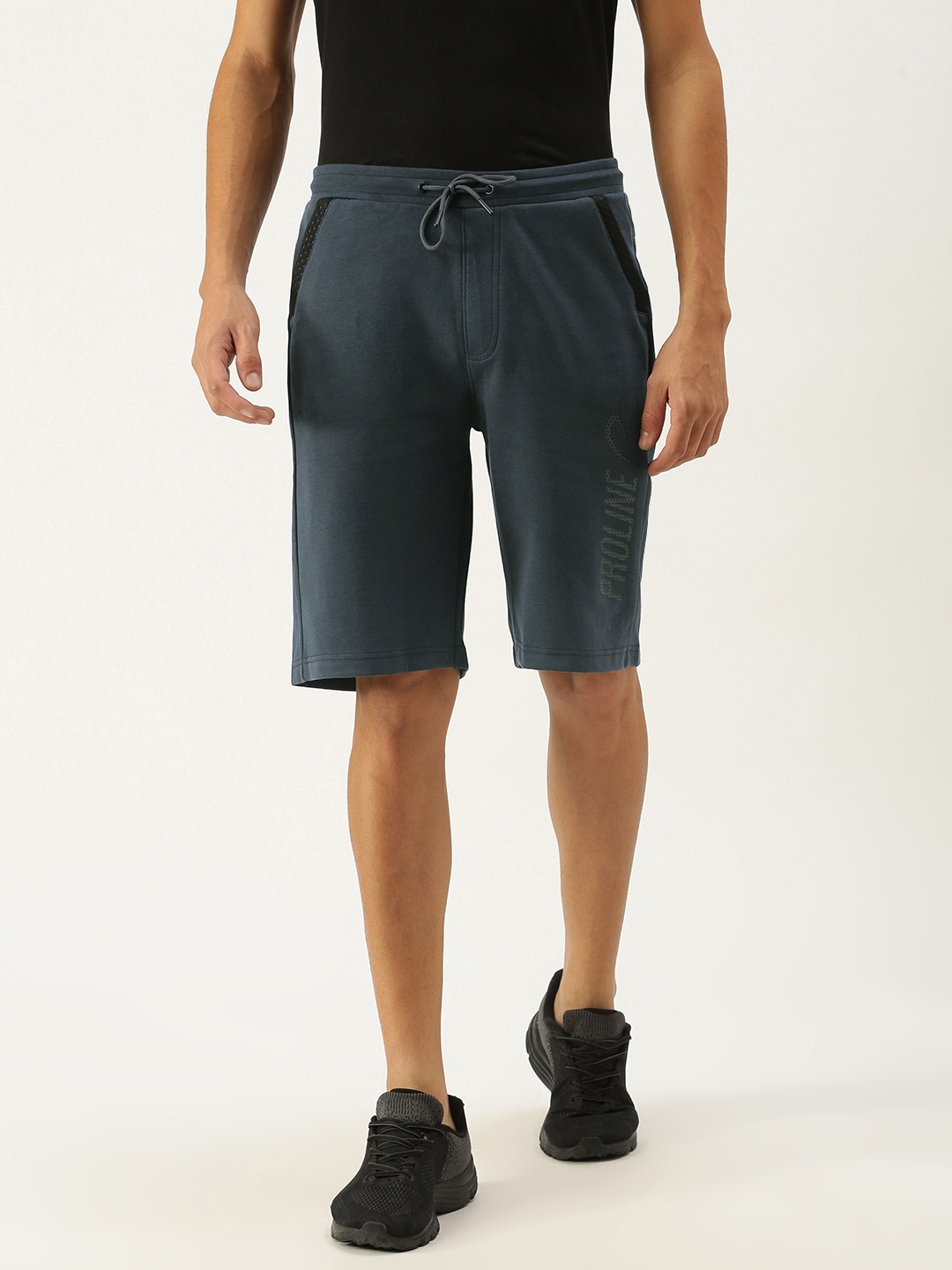 

Proline Active Men Navy Blue Brand Logo Printed Regular Shorts