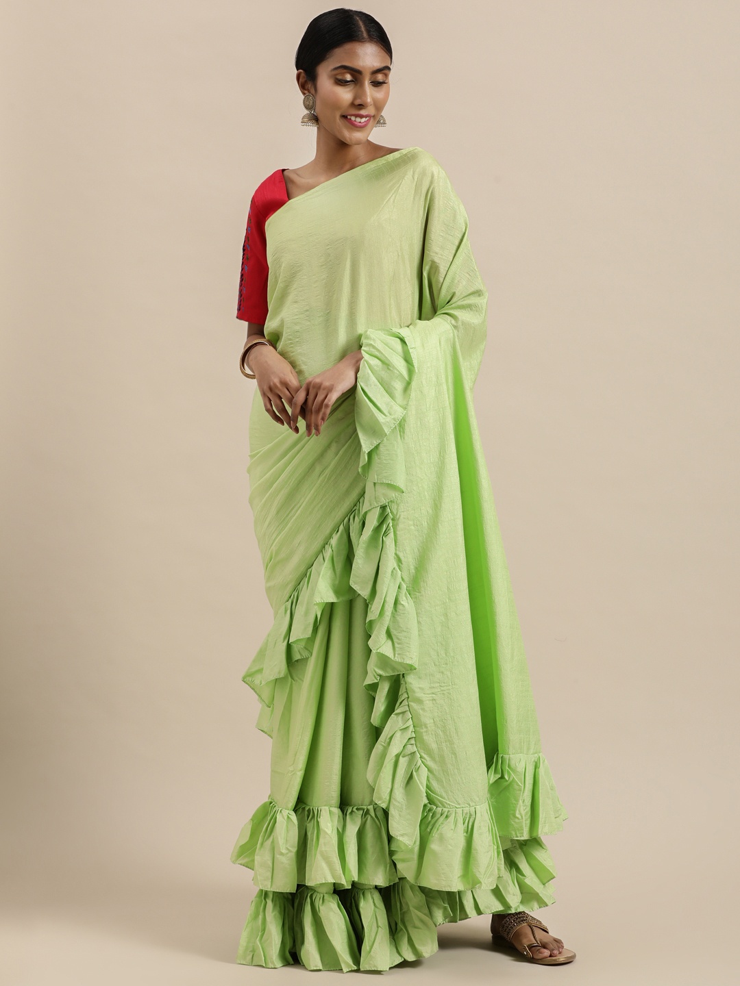 

Kvsfab Green Solid Dola Silk Ruffle Saree