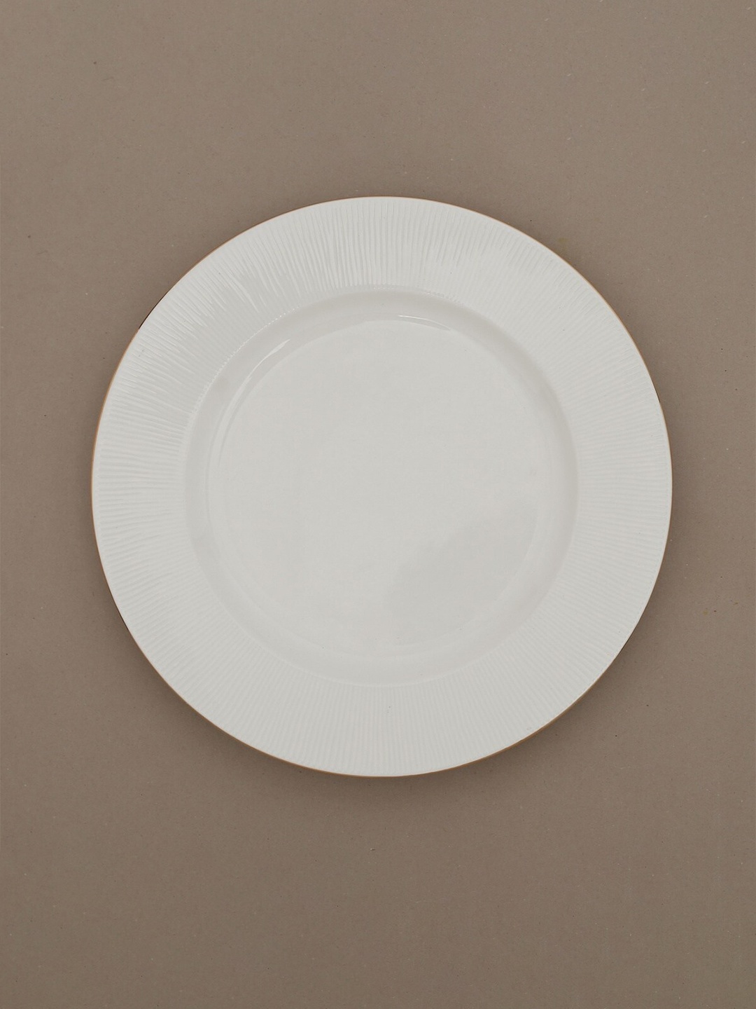 

Home Centre Off White Ceramic Matte Plate