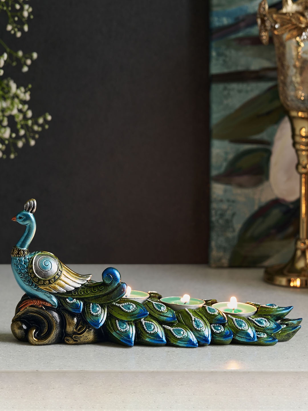 

Home Centre Blue & Green Mayur Mayil Peacock T-Light Holder