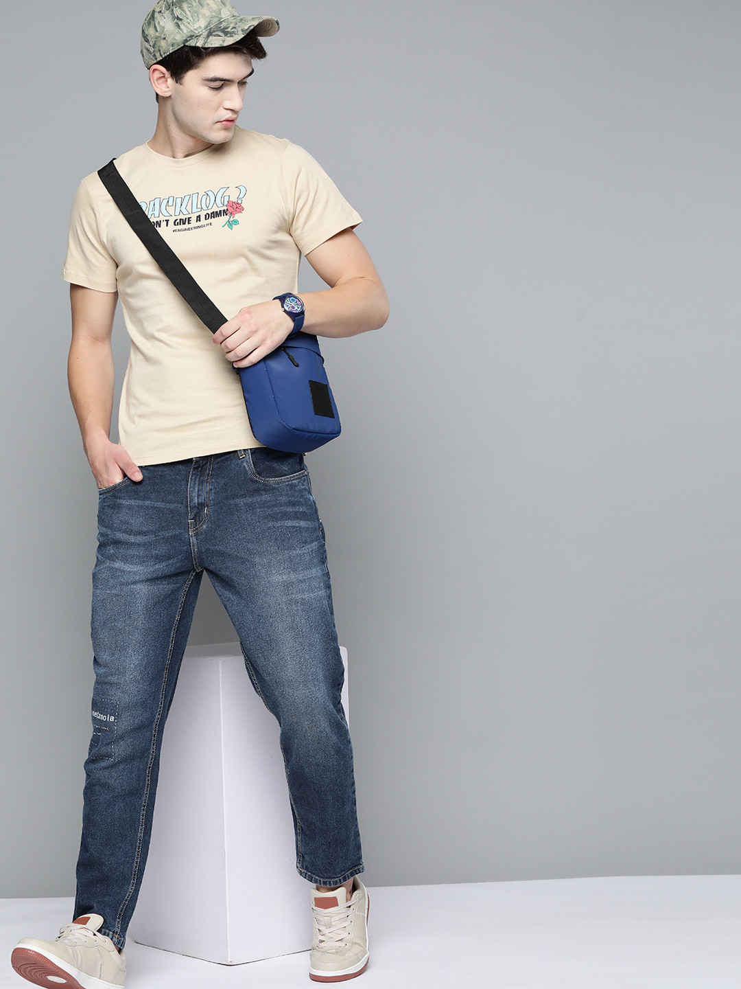 

Kook N Keech Men Navy Blue Carrot Light Fade Stretchable Jeans