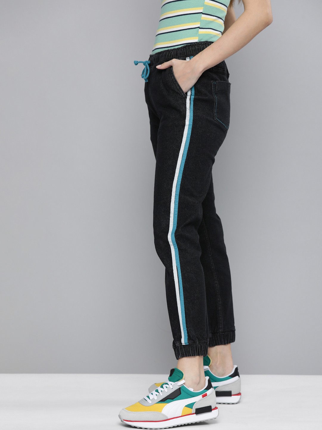 

Kook N Keech Women Black Slim Jogger Light Fade Stretchable Jeans with Side Stripes
