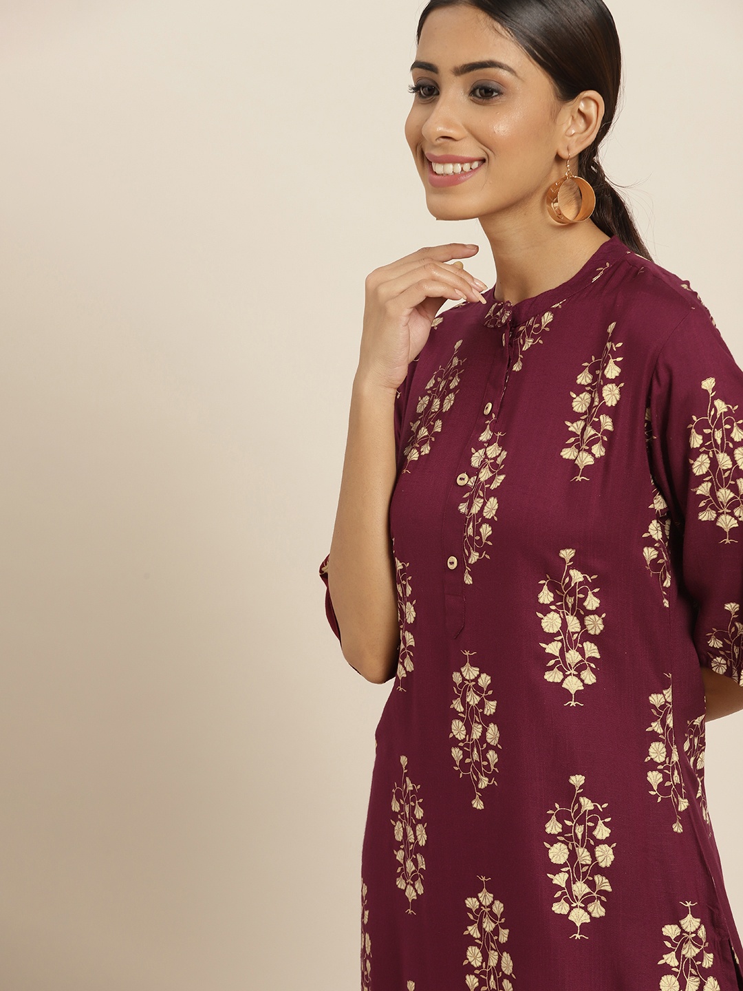 

Sangria Women Burgundy & Golden Ethnic Motifs Printed Straight Kurta