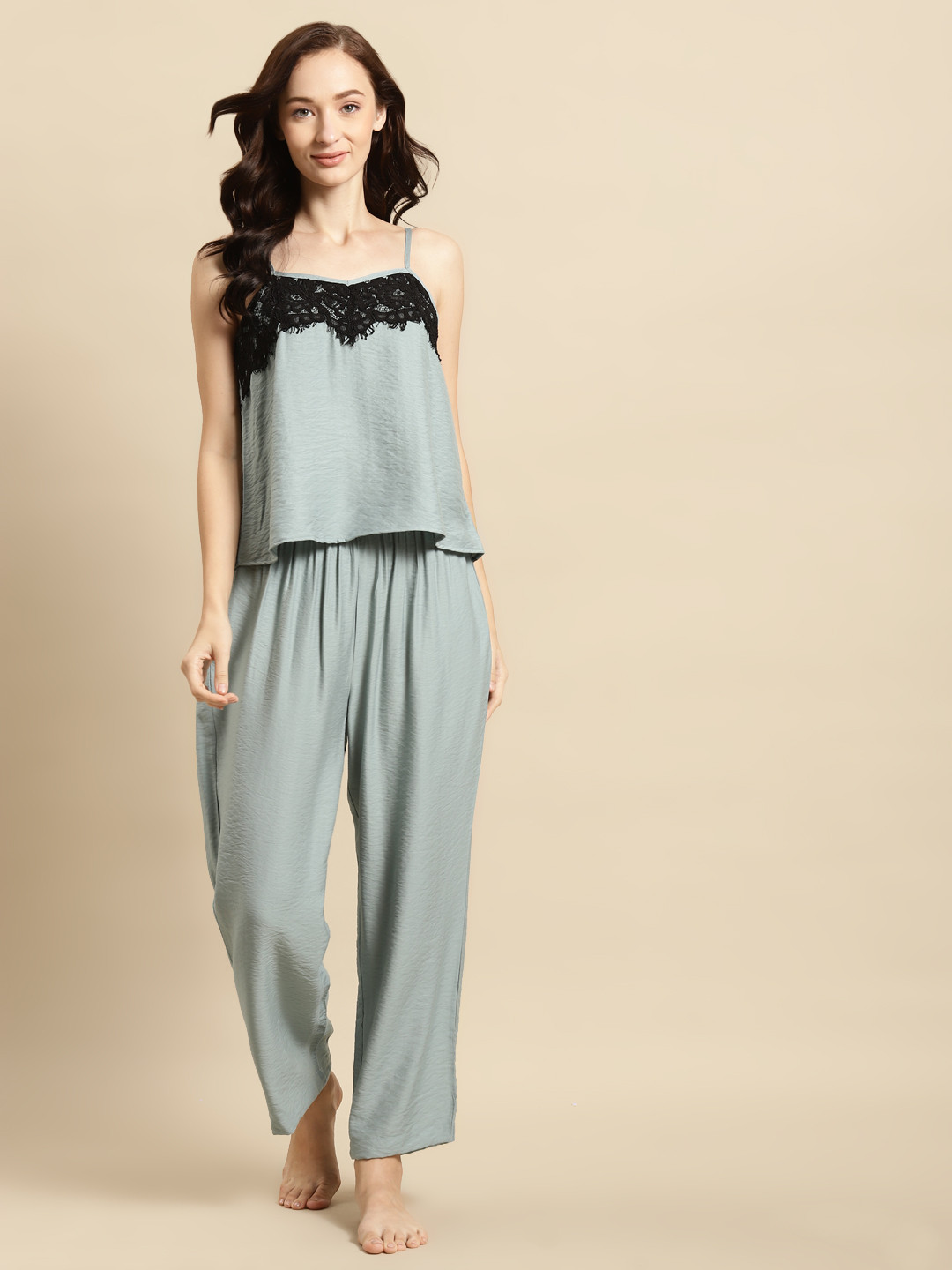 

WoowZerz Women Blue & Black Solid Pyjama Set with Lace Inserts