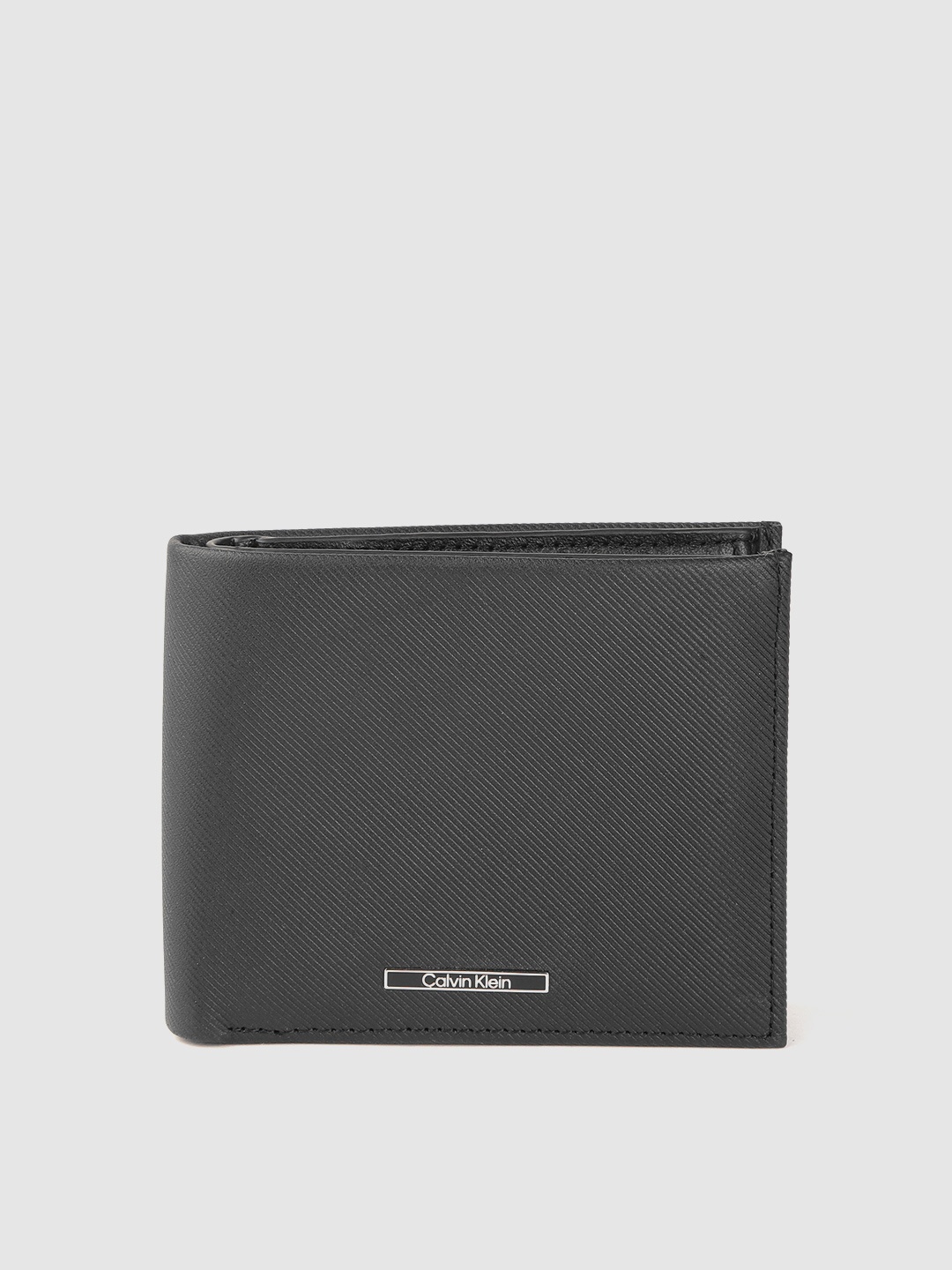 

Calvin Klein Men Black Textured Leather Two Fold Wallet