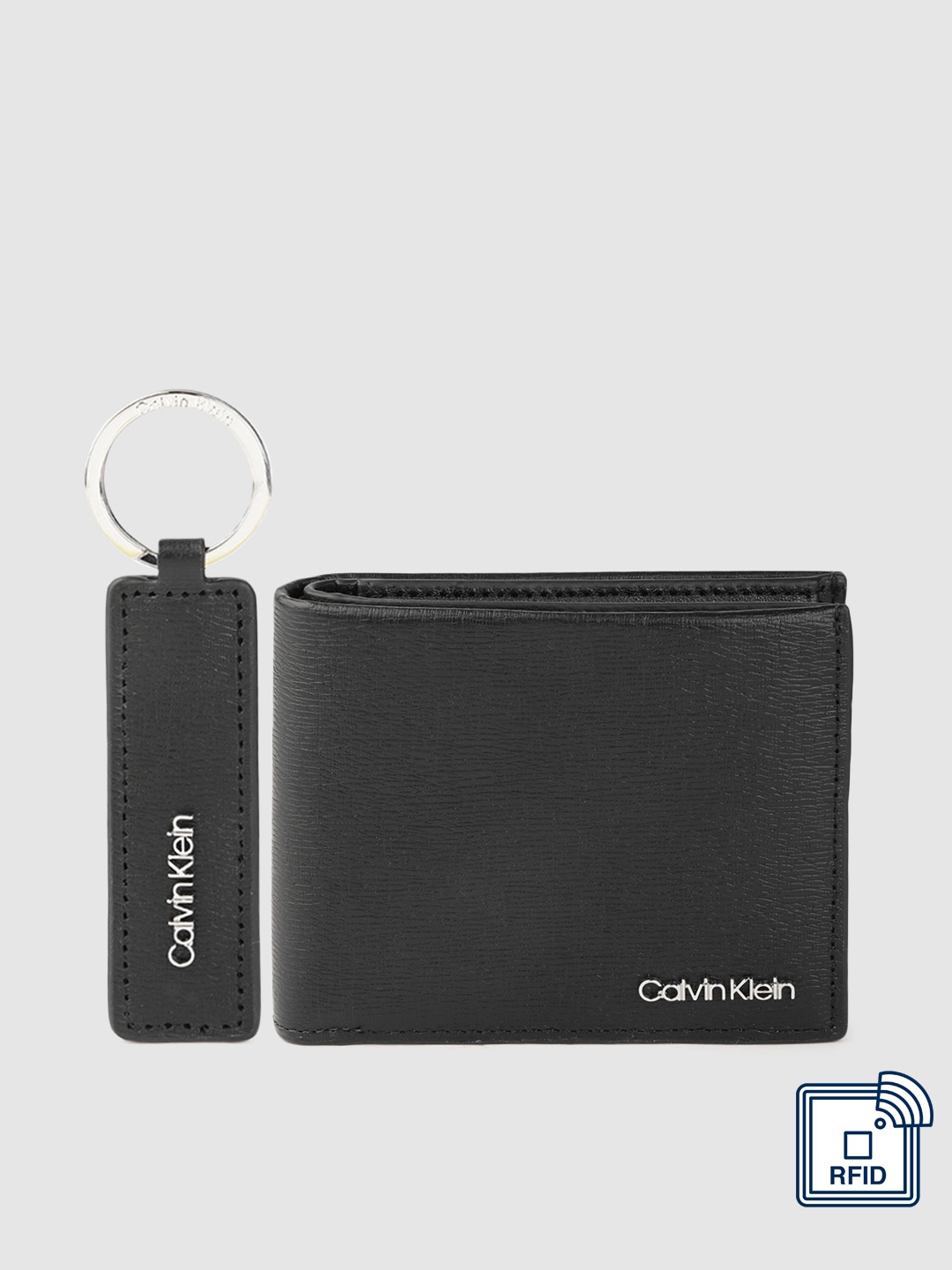 

Calvin Klein Men Black Textured Leather Two Fold Wallet