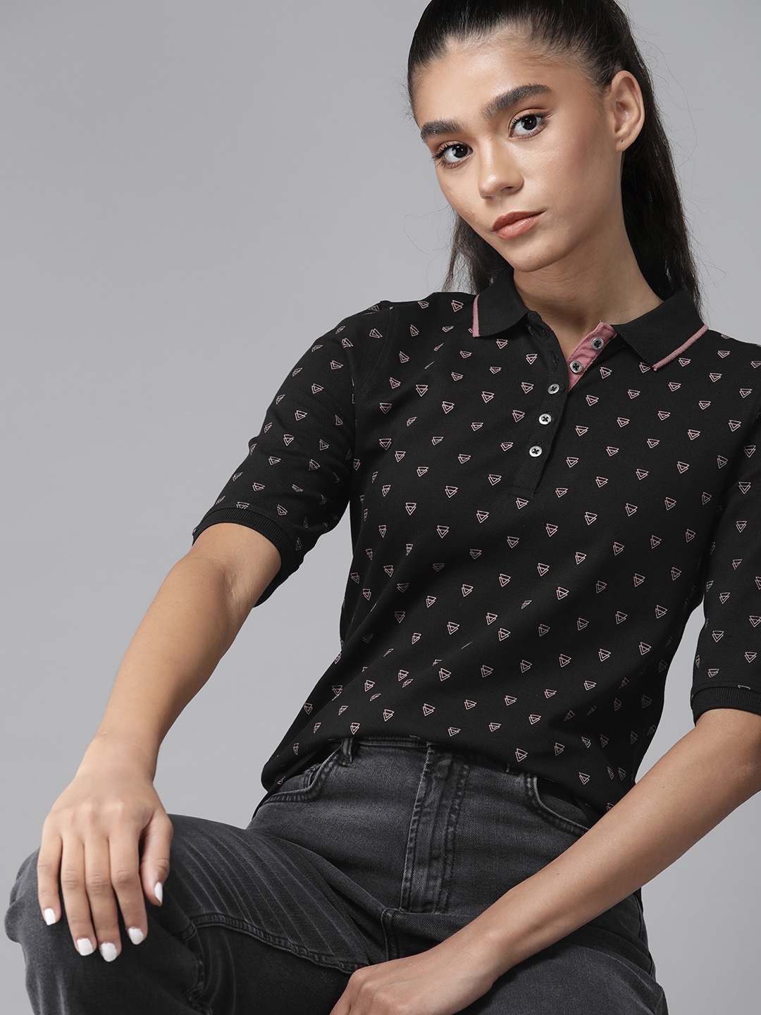 

Roadster Women Black & Pink Printed Polo Collar T-shirt