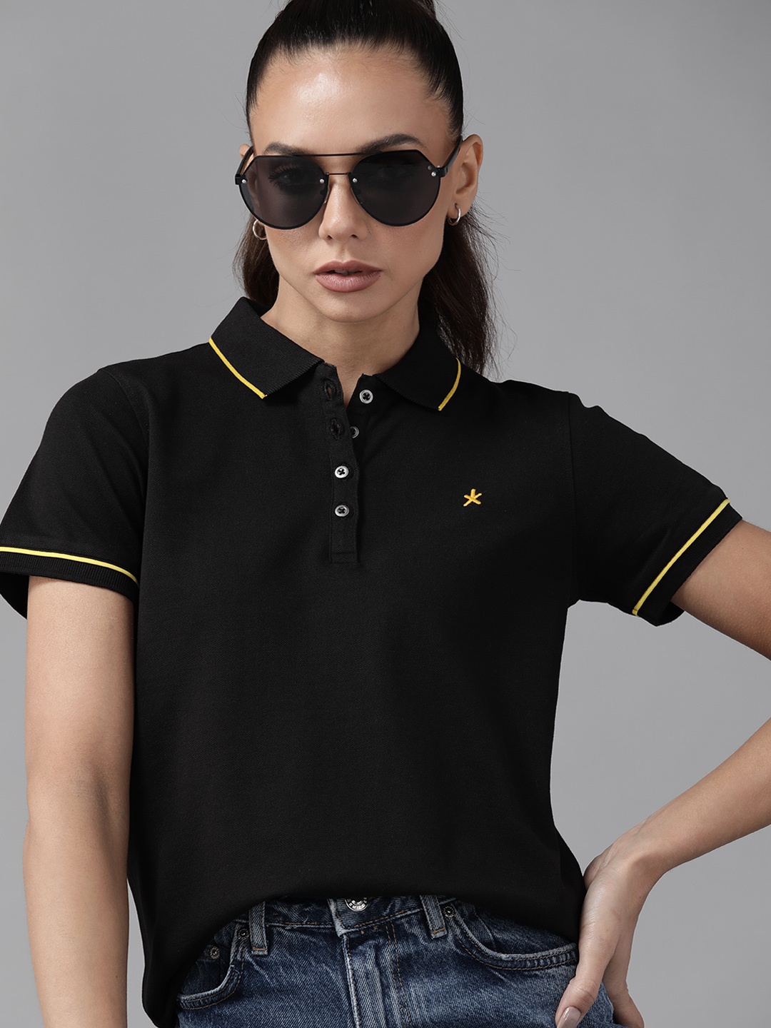 

Roadster Women Black Solid Polo Collar T-shirt