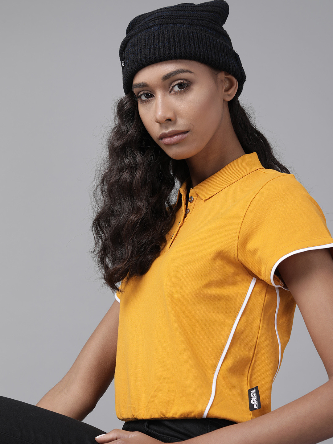 

Roadster Women Yellow Solid Polo Collar T-shirt