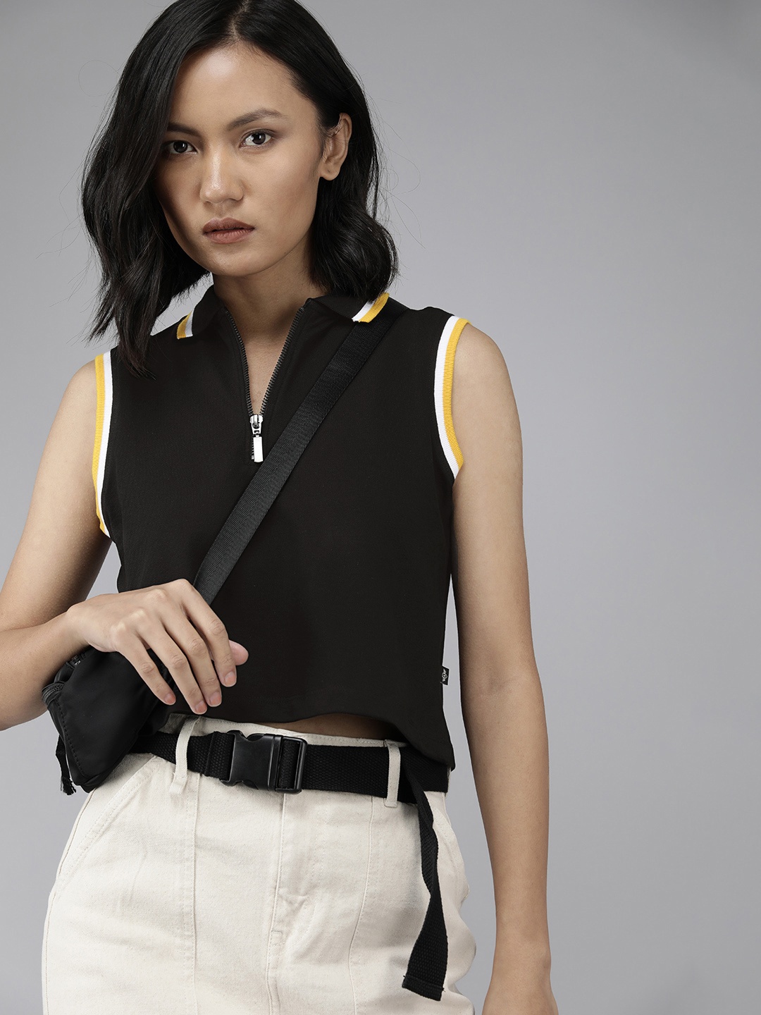 

The Roadster Lifestyle Co Women Black Solid Polo Collar T-shirt With Contrast Rib Detail