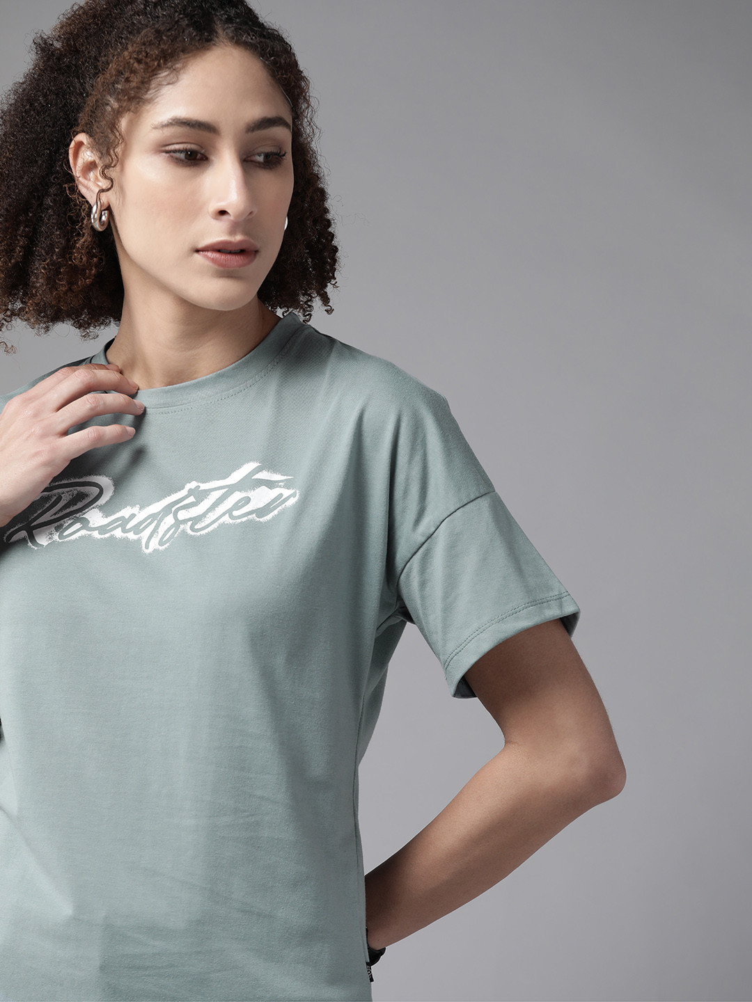 

Roadster Women Blue Brand Logo Drop Shoulder Sleeves Printed T-shirt