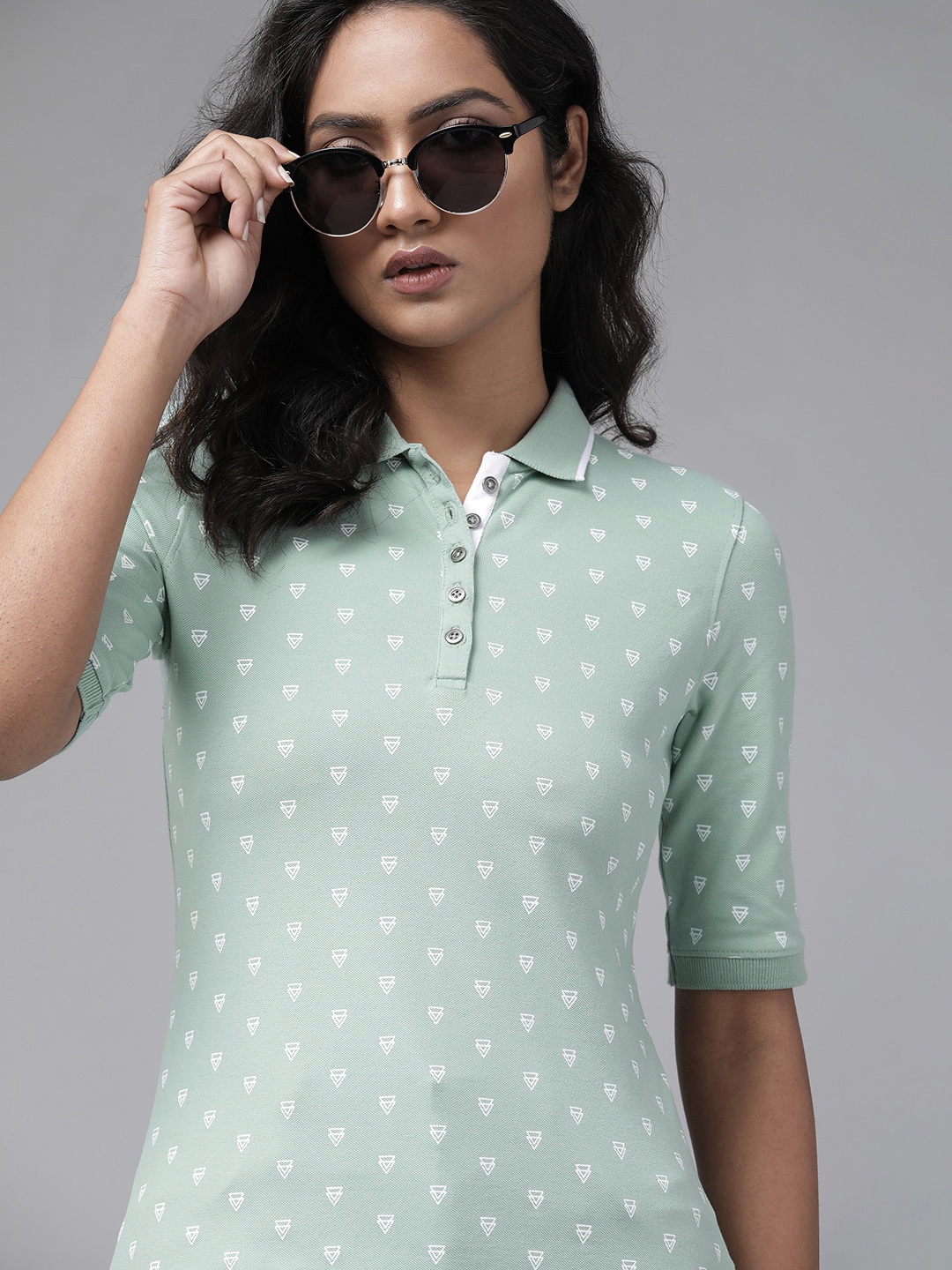 

Roadster Women Green & White Printed Polo Collar T-shirt