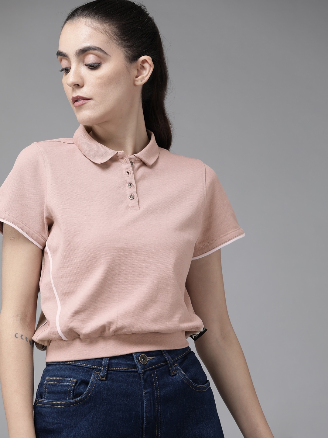 

Roadster Women Rose Solid Polo Collar T-shirt