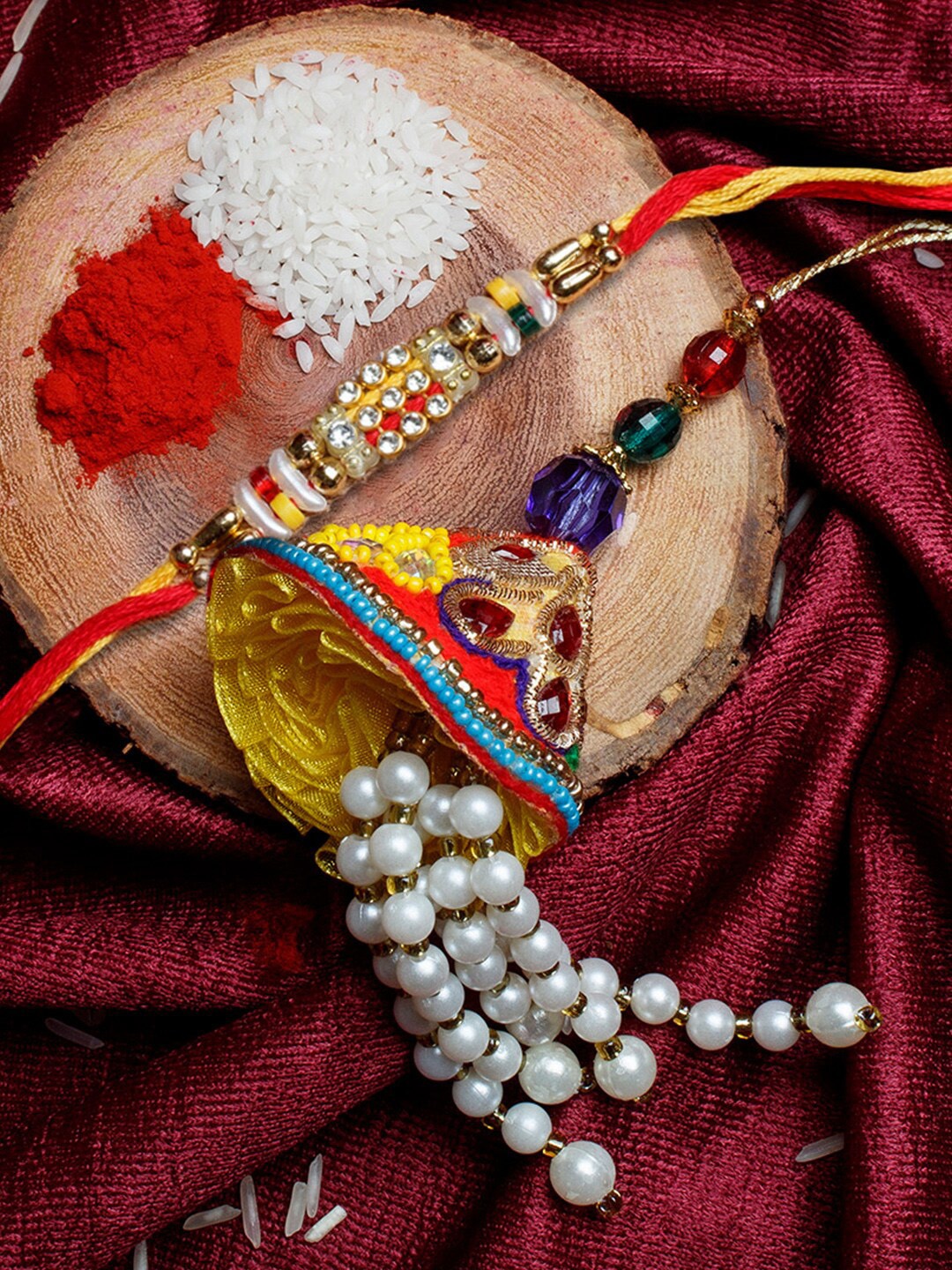 

Shoshaa Set Of 2 Stone-Studded & Beaded Rakhi With Roli & Chawal, Yellow