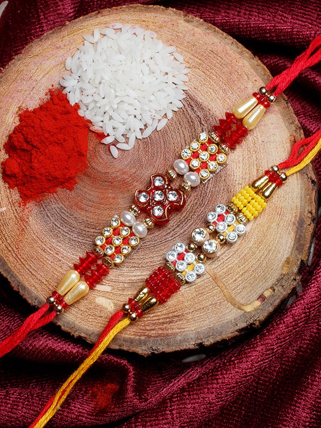 

Shoshaa Set Of 2 Stone-Studded Beaded Yellow & Red Thread Combo Bhai Rakhi