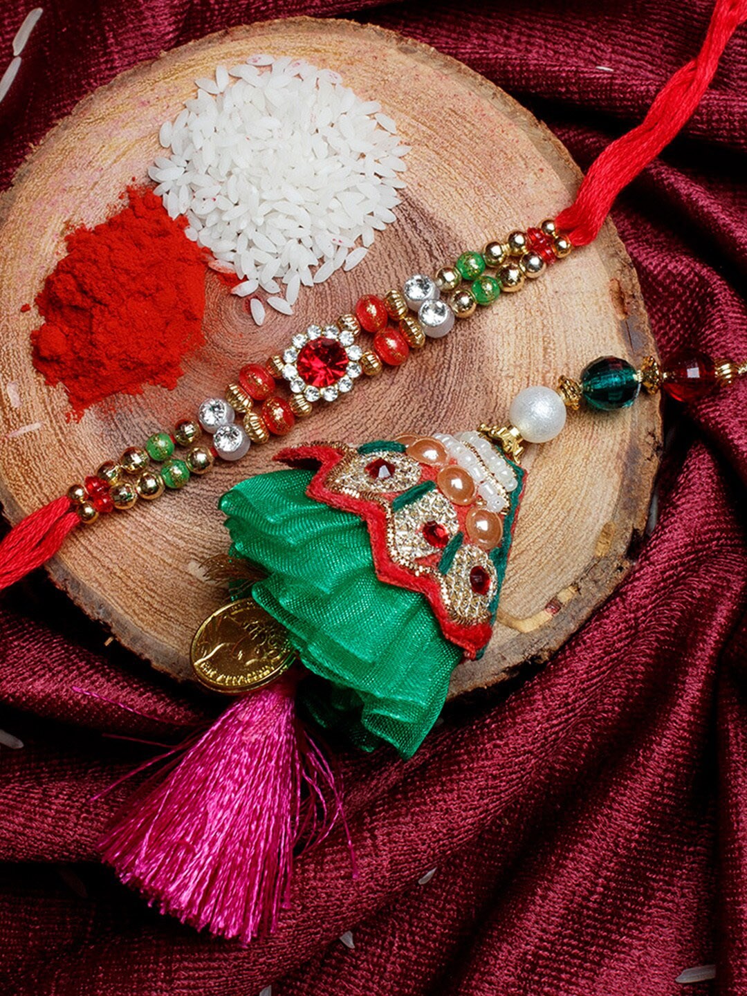

Shoshaa Set Of 2 Stone-Studded & Beaded Lumba Bhai Bhabhi Rakhi With Roli & Chawal, Red