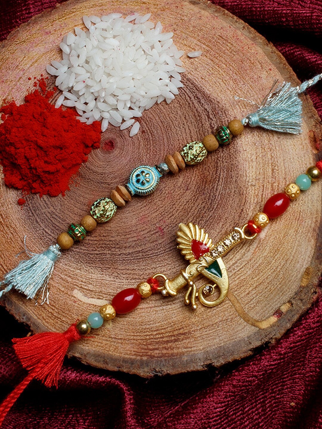 

Shoshaa Men Set Of 2 Red & Gold-Coloured Thread Rakhi With Roli Chawal