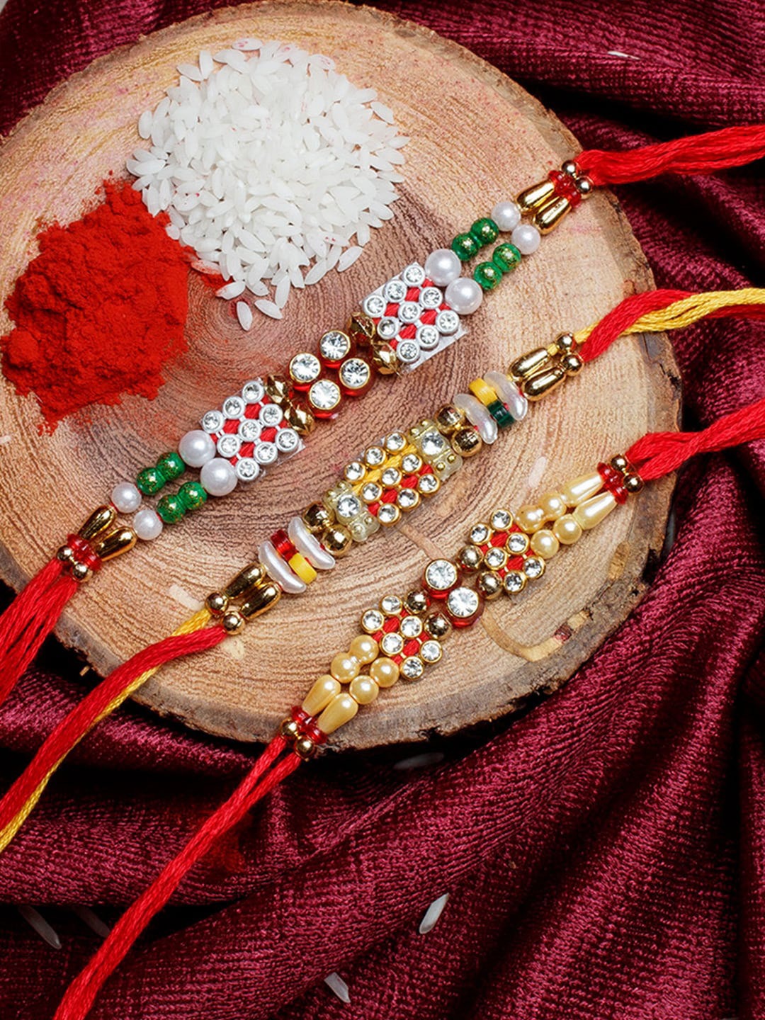 

Shoshaa Men Set Of 3 Stone-Studded Beaded Ethnic Handcrafted Thread Rakhi With Roli Chawal, Red