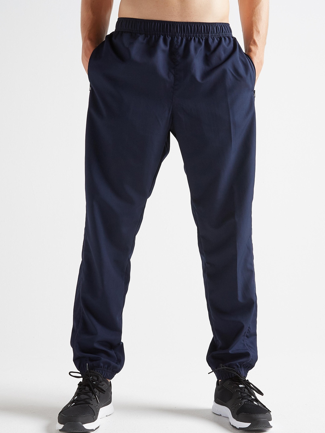 

Domyos By Decathlon Men Blue Solid Slim-fit Quick Dry Fitness Track Pant