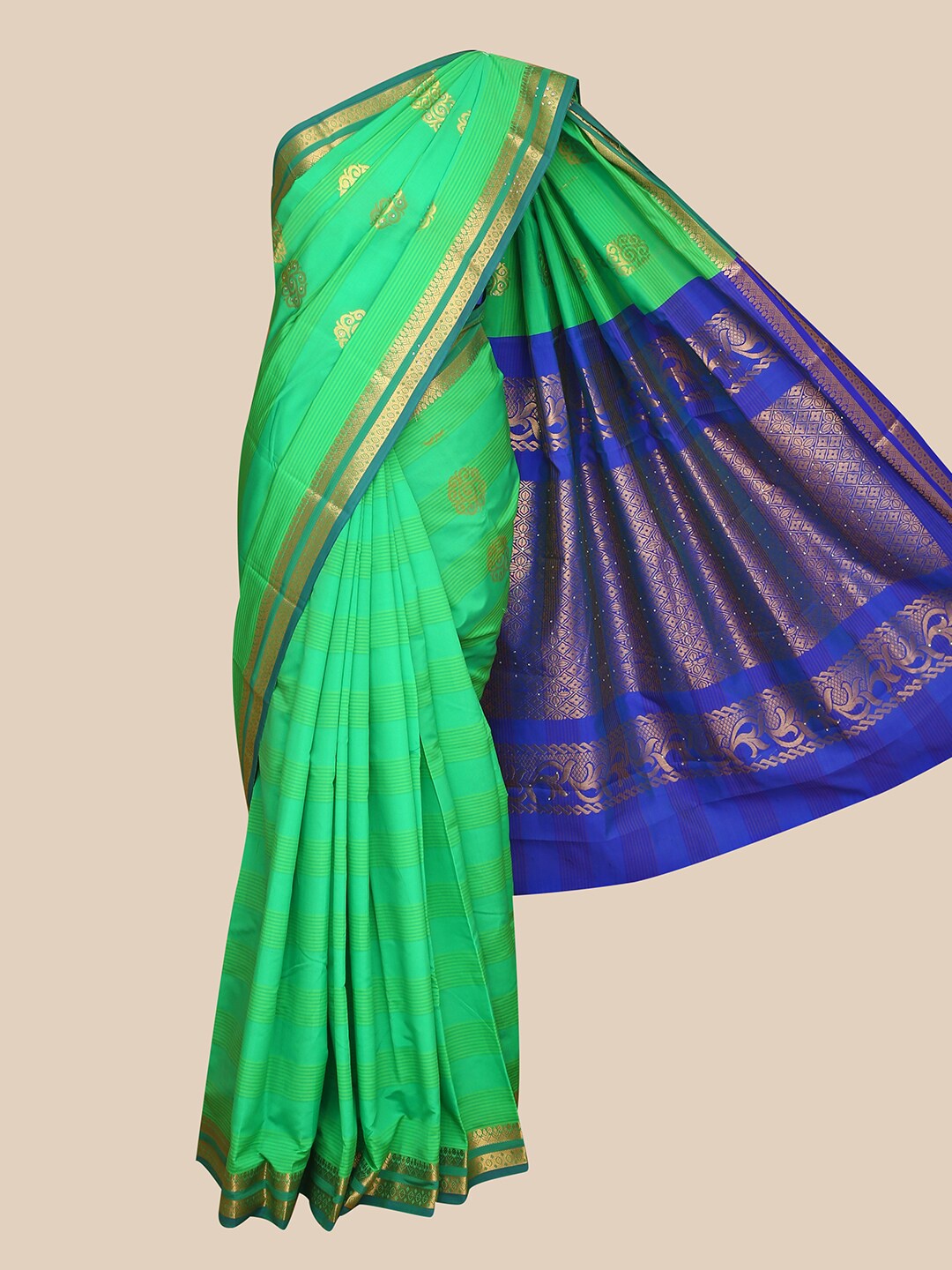 

The Chennai Silks Green & Blue Ethnic Motifs Zari Art Silk Saree