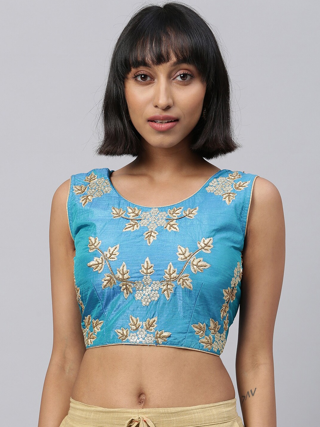 

Amrutam Fab Women Blue & Gold-Coloured Embroidered Saree Blouse