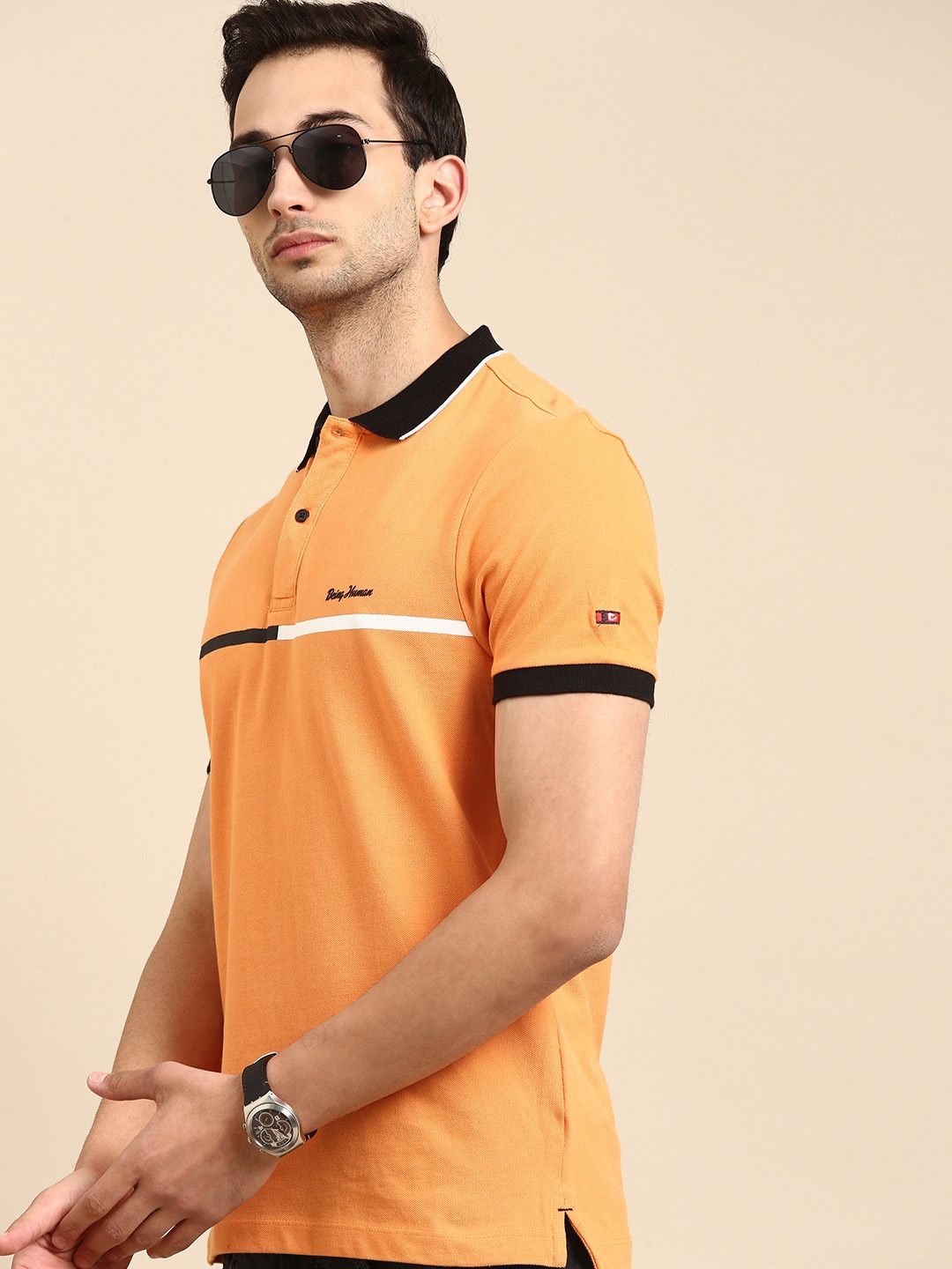 

Being Human Men Orange Solid Pure Cotton Polo Collar Pure Cotton T-shirt With Stripe Detail