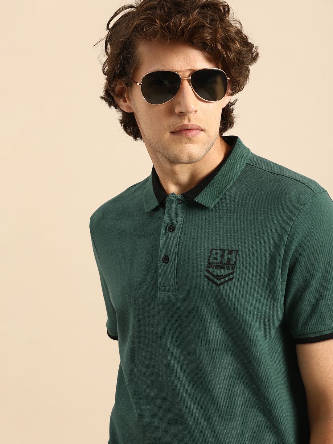 

Being Human Men Green Solid Polo Collar Pure Cotton T-shirt with Printed Detail