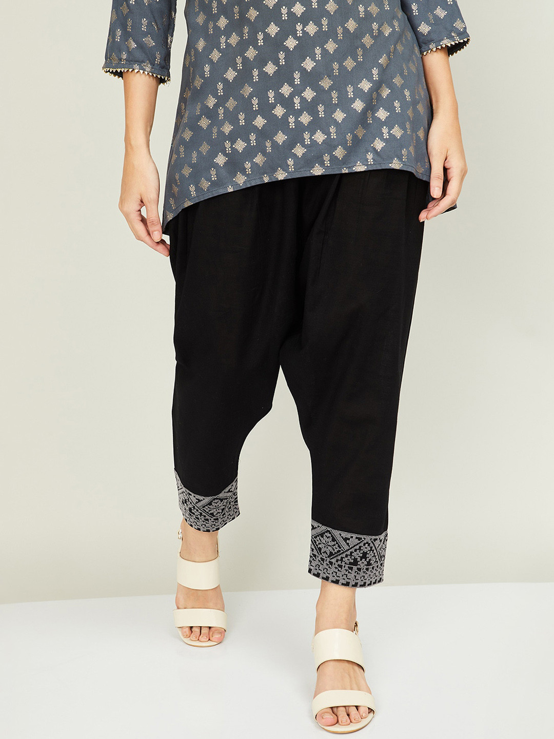 

Melange by Lifestyle Women Black Solid Trousers