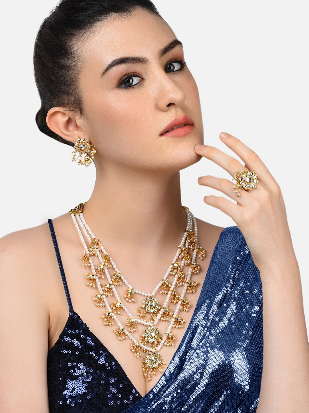 

Zaveri Pearls Gold-Plated & White Kundan-Studded & Pearl Beaded Jewellery Set