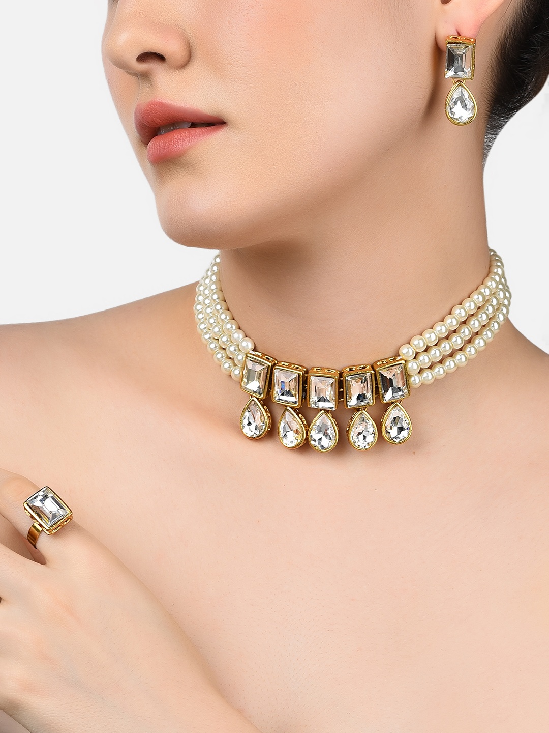 

Zaveri Pearls Gold-Plated White Stone-Studded & Pearl-Beaded Jewellery Set