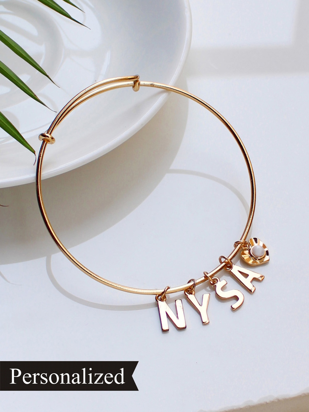 

Runway Ritual Women Gold-Toned & Off White Gold-Plated Adjustable Charm Bracelet